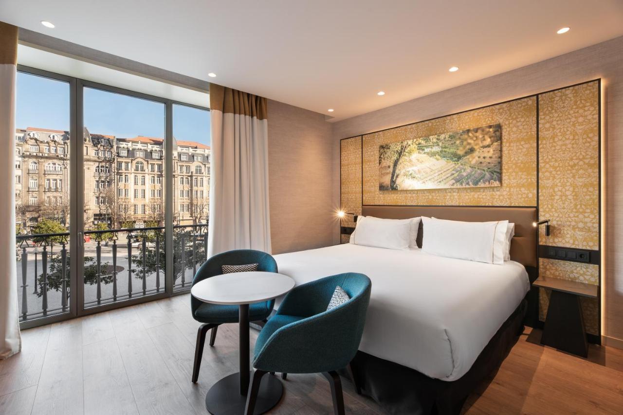 Eurostars Aliados Hotel Porto Bagian luar foto Deluxe room