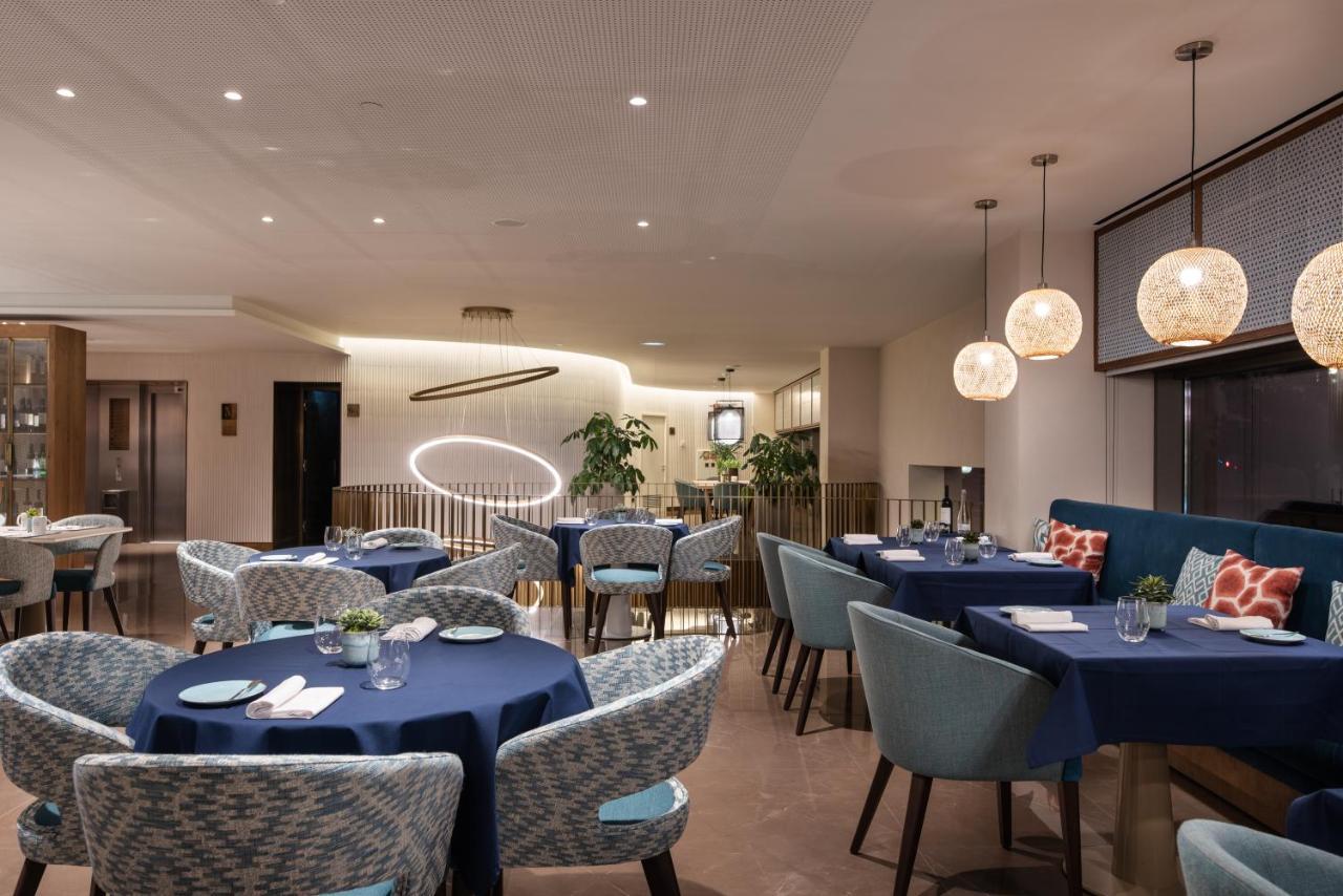 Eurostars Aliados Hotel Porto Bagian luar foto The restaurant