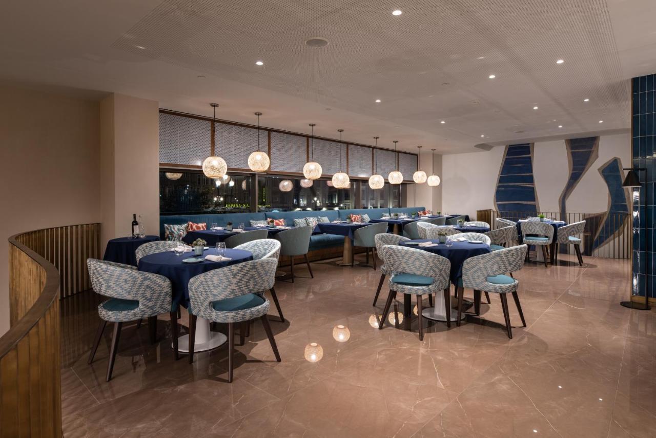 Eurostars Aliados Hotel Porto Bagian luar foto The restaurant